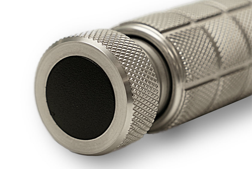 Close-up of the knurled end cap on the SportGrips REVOLUTION 2.0, featuring non-slip grip texture and precision-machined aluminum design